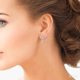 1/6 ctw Split Side Double Heart Round Cut Diamond Earrings in 10K White Gold